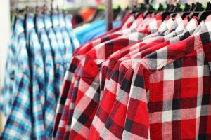 blue and red men shirts on hanger